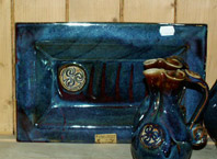 Colm de Ris Pottery Plate with ancient Irish symbol, click on image to enlarge
