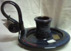 Colm de Ris plate with handle type candle holder